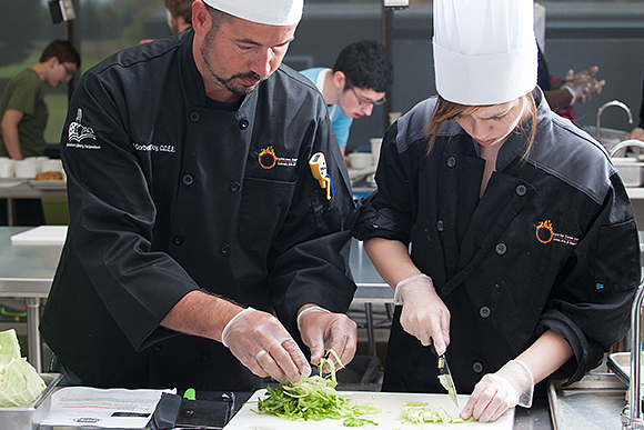 Chef Corbett Day has helped culinary students secure more than $2M in scholarships.