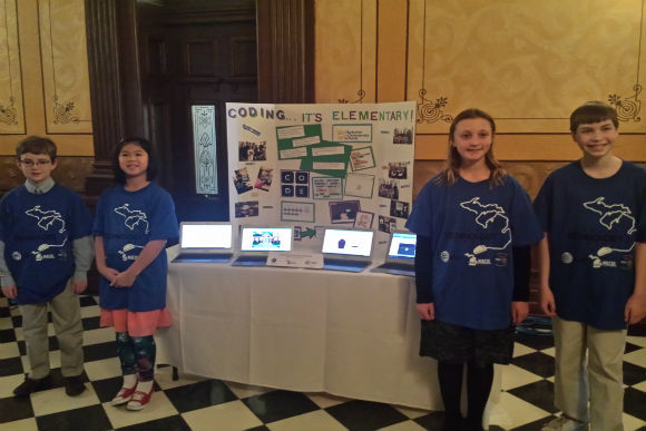 Coding Club students presenting at Macul Student Technology Showcase in Lansing.