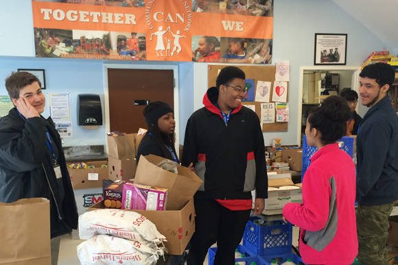 Pathways students taking part in a community service project sponsored by the Community Action Network held at the Bryant Community Center. 