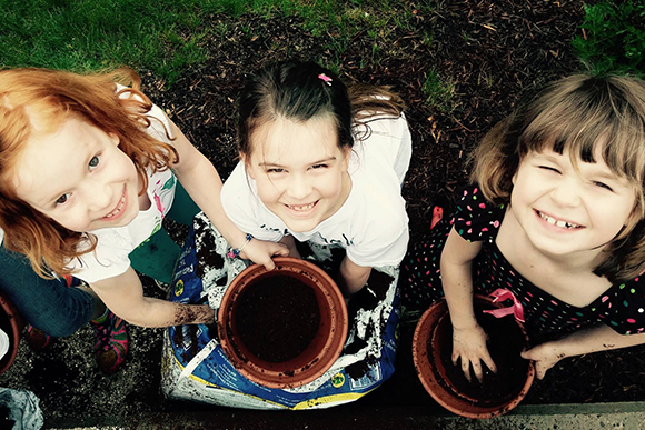 Ruby, Abigail and Ashlyn of learn to reduce, reuse and recycle through University Hills Elementary's Eco Eagles.