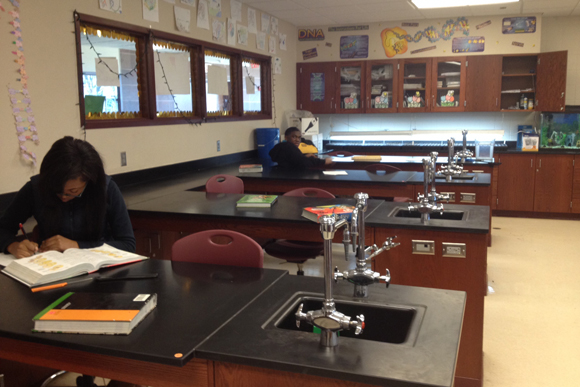 Harper Woods students prepare for projects in the greenhouse.