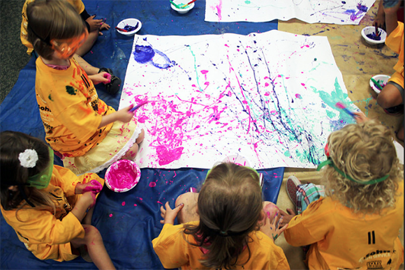 Impression 5 campers making a splash of color in Awesome Art camp. 