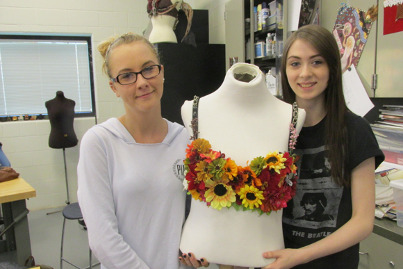 Caitlin Vanderlip and Amanda Hartwig pose with their In Her Cups entry.