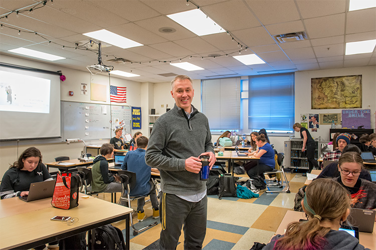 Saline High School teacher Jamie Vollrath with one of his zine classes.