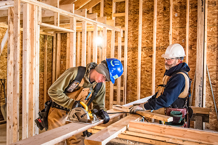 John Birko supervises a student in the AAPS Homebuilding Class.