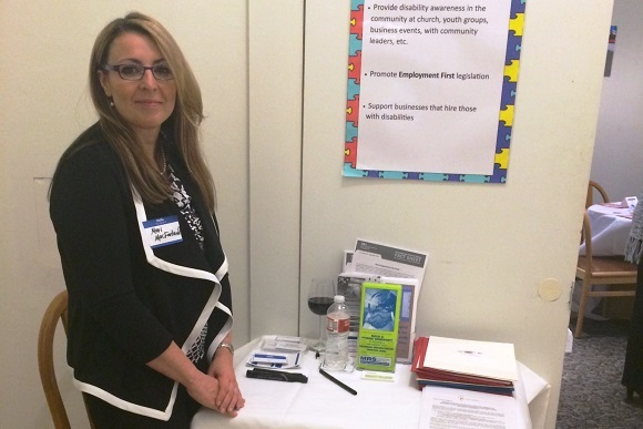 Mari MacFarland, a teacher consultant at Livonia Public Schools, welcomes participants during a START Community Conversation in Wayne County in December 2014.