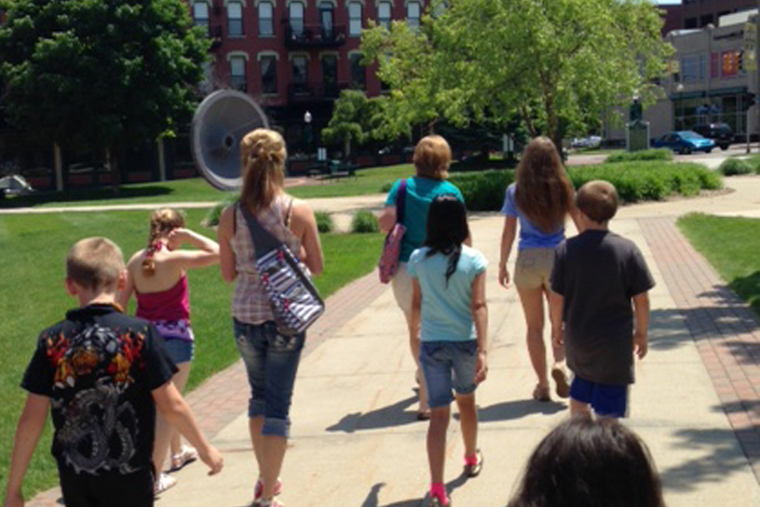 Bridge Builders students and volunteers heading to their summer activity.