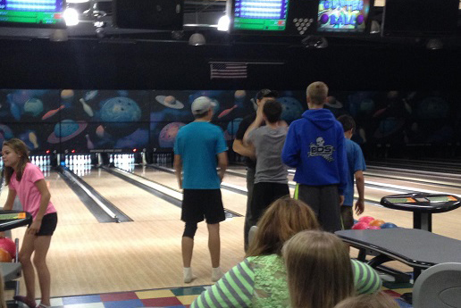 Students bowling at the partner youth center. 
