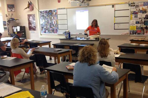 Boyne Tech Conference attendees listen attentively to a presentation. 